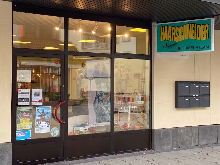 Haarschneider ihr Friseurteam
